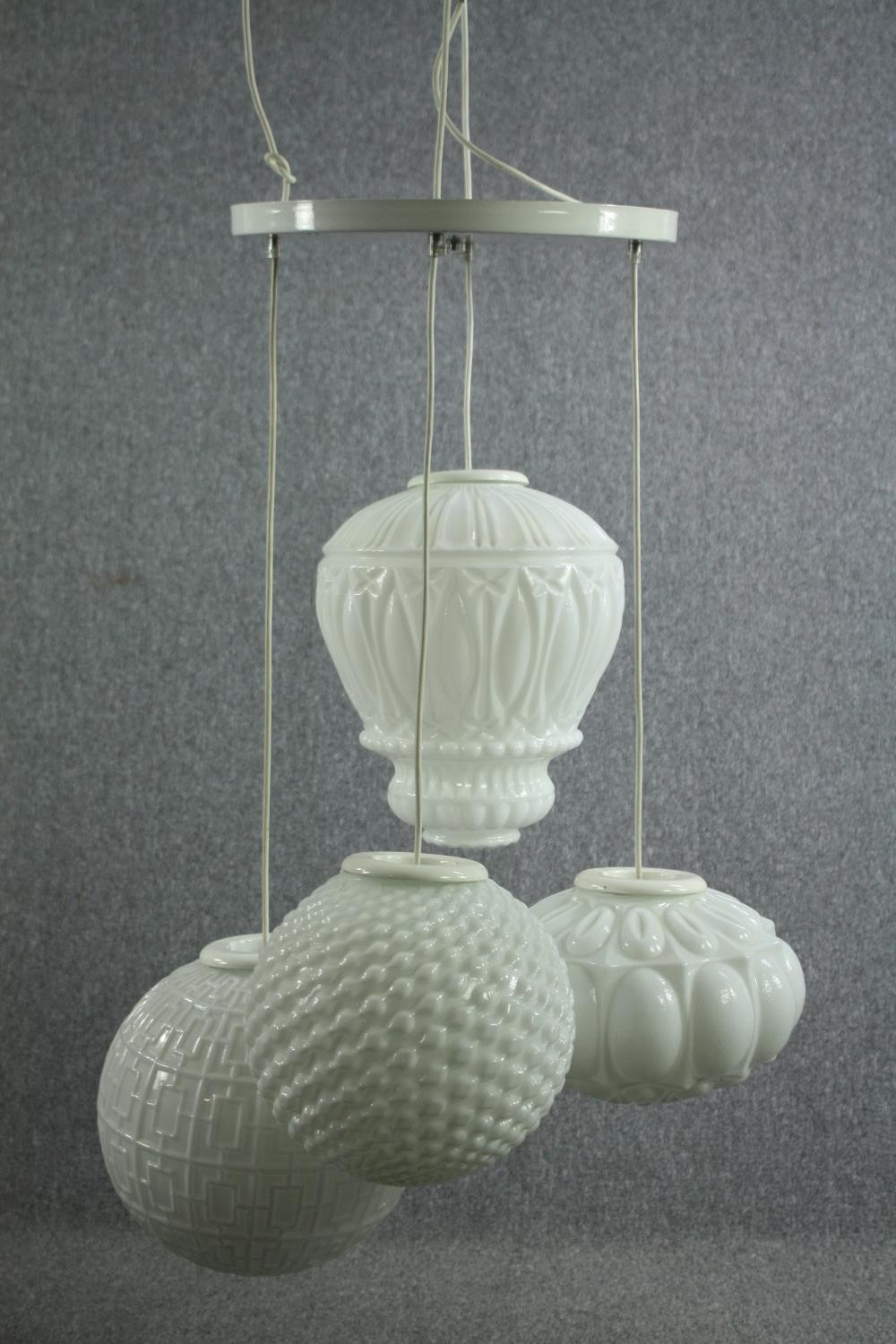 An arabesque chandelier by Mm Design. Four adjustable white glass shades each a different shape - Image 2 of 8