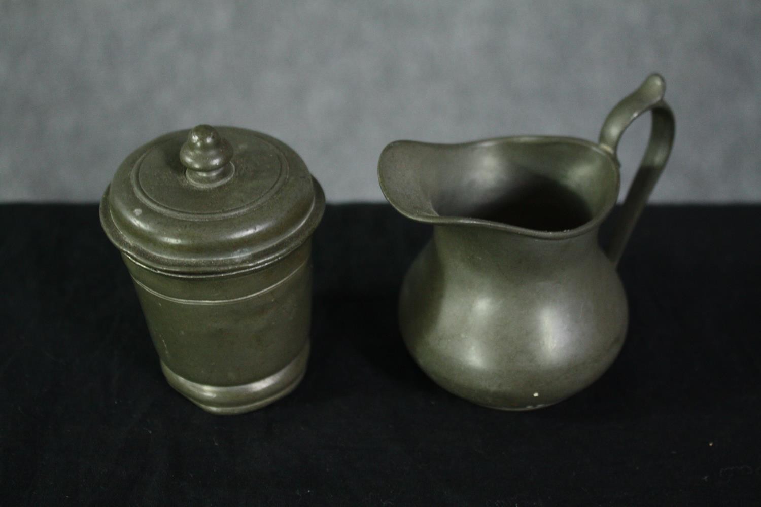 A mixed collection of pewterware. Including jugs, pots and a cup. H.20cm. (largest) - Image 3 of 5