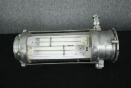 A mid century industrial aluminium and tubular glass wall light with fluorescent bulb. Originating