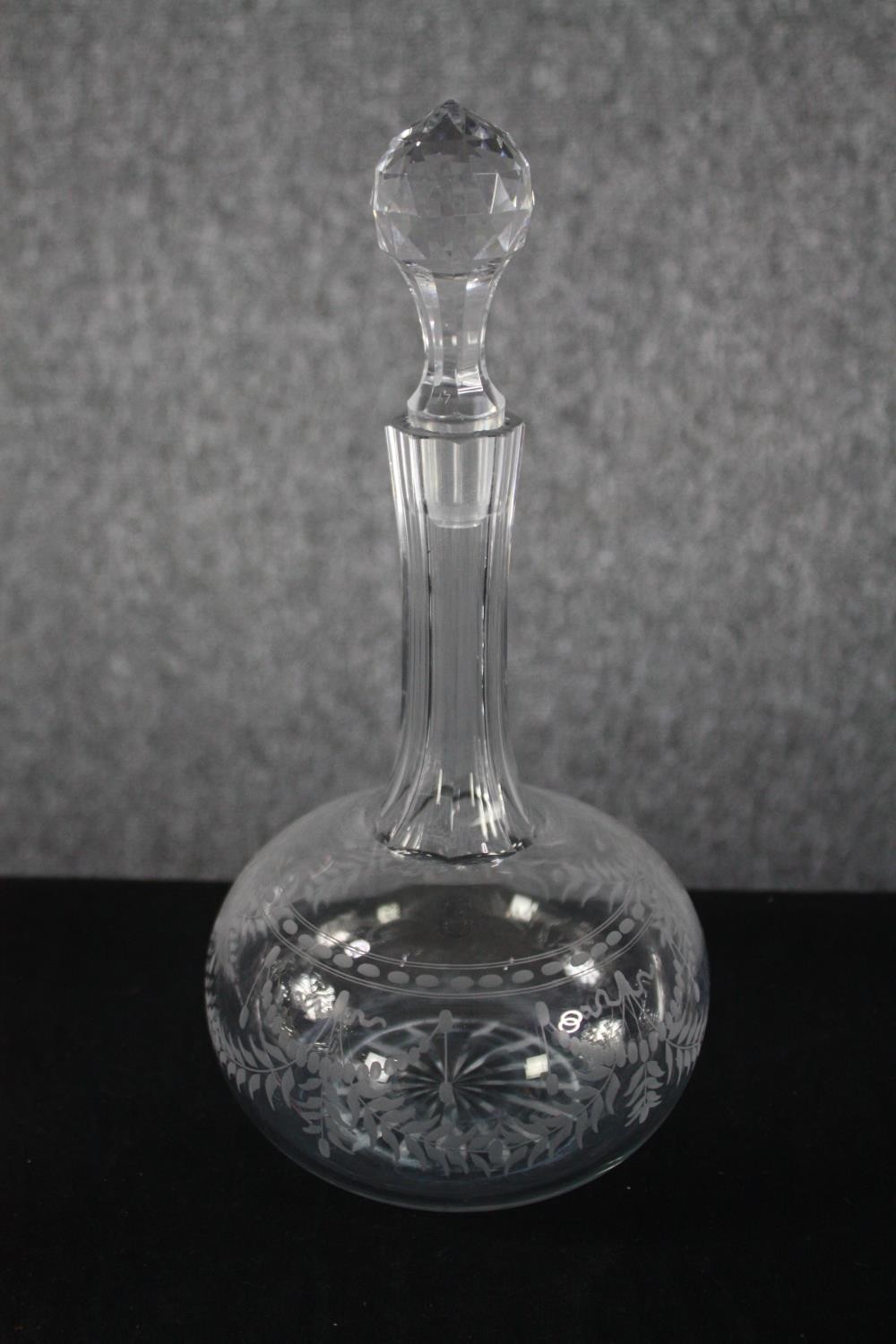 Four decanters with their stoppers. Cut glass with etched decoration. H.33cm. (largest) Proceeds - Image 2 of 3