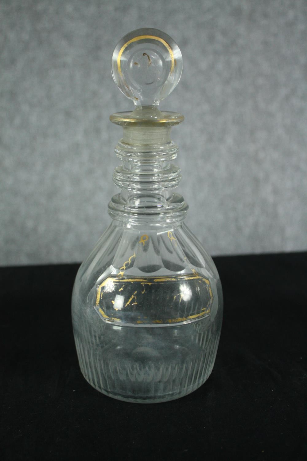 A collection of four early twentieth century cut glass decanters complete with their stoppers. One - Image 3 of 4