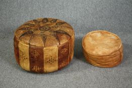 Two hand stitched leather pouffes. Both well worn and nicely aged. H.36 Dia 55cm. (largest)