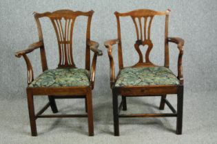 Carver armchairs, a near pair, Georgian oak and elm.