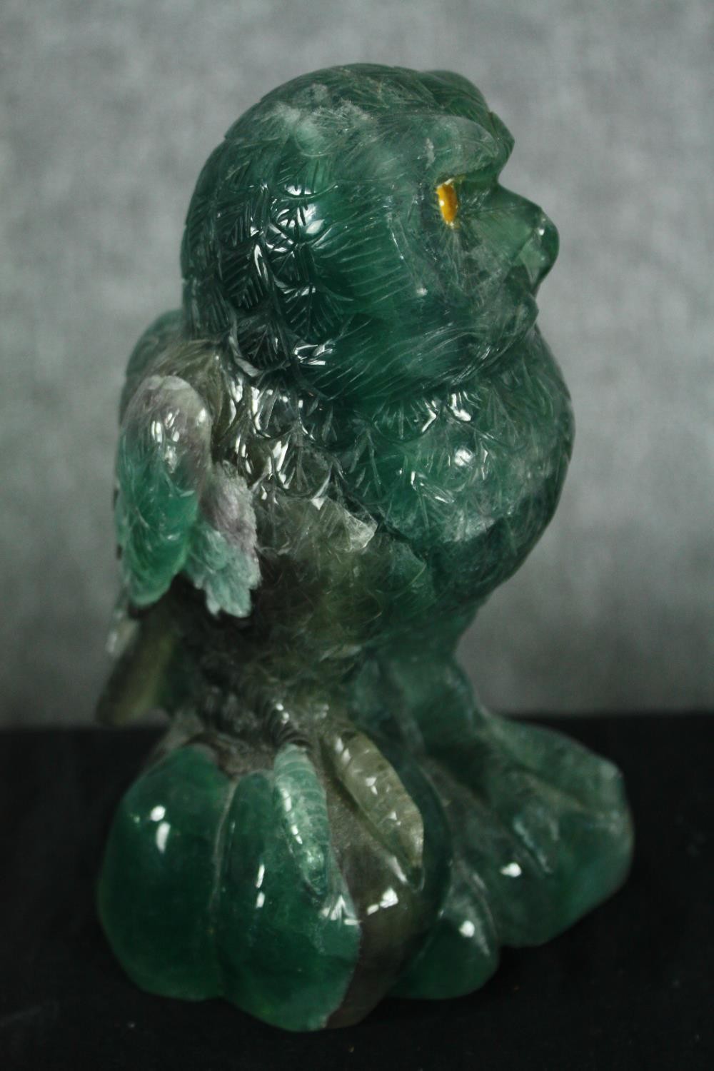 A carved fluorite owl with yellow glass eyes. H.18cm. - Image 2 of 5