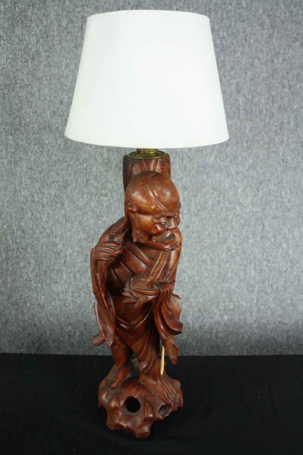 A mid century carved figurative Chinese lamp with brass fittings and a modern desk lamp. H.60cm. ( - Image 2 of 5