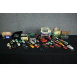 A collection of vintage toy Corgi cars. Includes an Aston Martin DB5. Condition varies from near