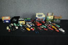 A collection of vintage toy Corgi cars. Includes an Aston Martin DB5. Condition varies from near