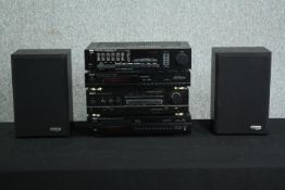 A late 80's Hi Fi stereo stack. Comprising a Denon stereo tuner, Yamaha and Akai amplifier with Bose