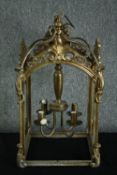 A decorative candle lantern with four holders. H.69 W.38 D.38cm.