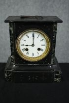 A 19th century slate and marble mantel clock with white enamel dial. Has it's key. H.20cm.