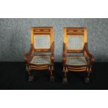 A pair of miniature hardwood and inlaid Egyptian style throne armchairs. H.33 W.28 D.25cm.