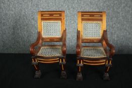 A pair of miniature hardwood and inlaid Egyptian style throne armchairs. H.33 W.28 D.25cm.