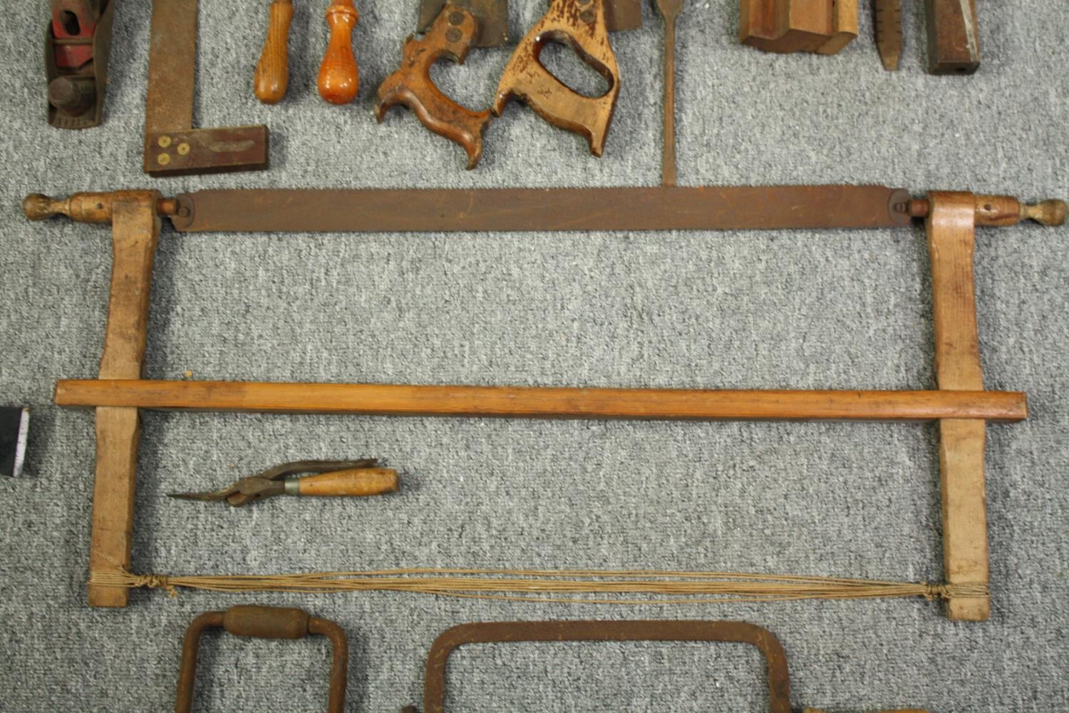 A large mid twentieth century machete and an assortment of wood working tools. The manchette with - Image 5 of 7