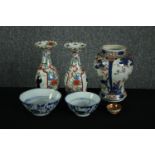 A collection of Japanese and Chinese ceramics, including a pair of gourd shaped hand painted vases