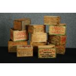 A collection of twelve decorated wooden tea boxes from Ceylon, some by Mordomo. H.15 W.26 D.17cm.