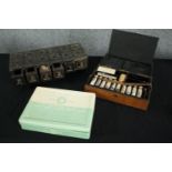 An African hardwood set of trinket drawers with stud detailing along with a vintage first aid kit