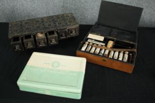 An African hardwood set of trinket drawers with stud detailing along with a vintage first aid kit