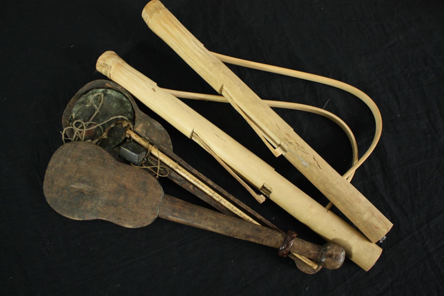 A 19th century Dotchin Opium scale, with brass scale and bone marker along with a bamboo snap gun.