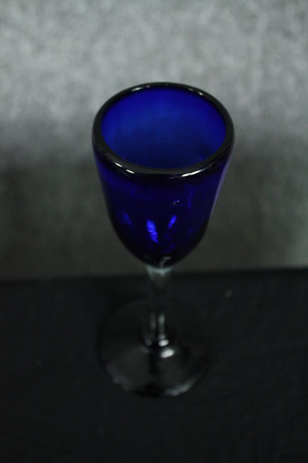 A set of six hand blown cobalt blue wine glasses with clear stems long with a set of five emerald - Image 3 of 5