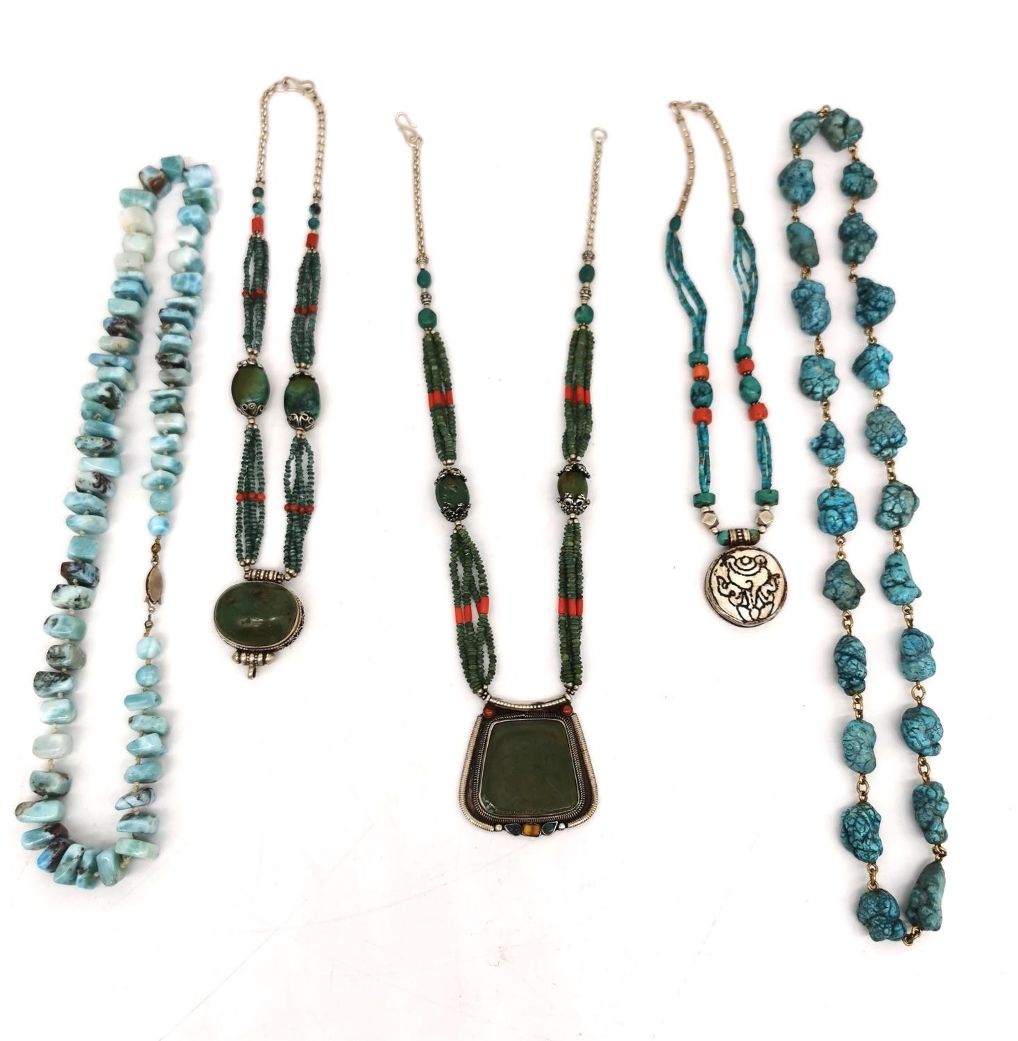 A collection of Turquoise, Silver and Coral Tibetan jewellery, including two silver and turquoise