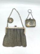 Two early 20th century silver coin purses. One silver mesh purse by Robert Chandler. French import