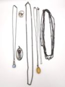 A collection of silver jewellery, including an Art Nouveau silver and amethyst folate design pendant