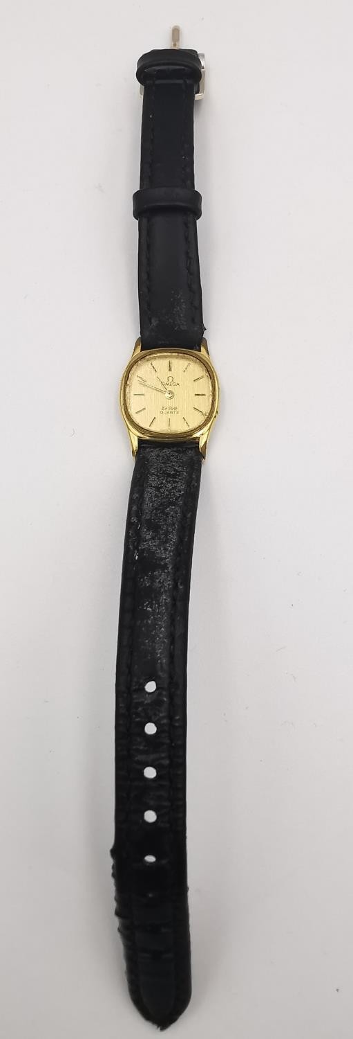 A ladies gold plated Omega de Ville quartz watch with black leather strap and steel back. The dial - Image 2 of 5