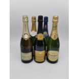 Five Bottles of Champagne: Fortnum & Mason 1994, Louis Roederer Brut, Perrier Jouer Grand Brut,