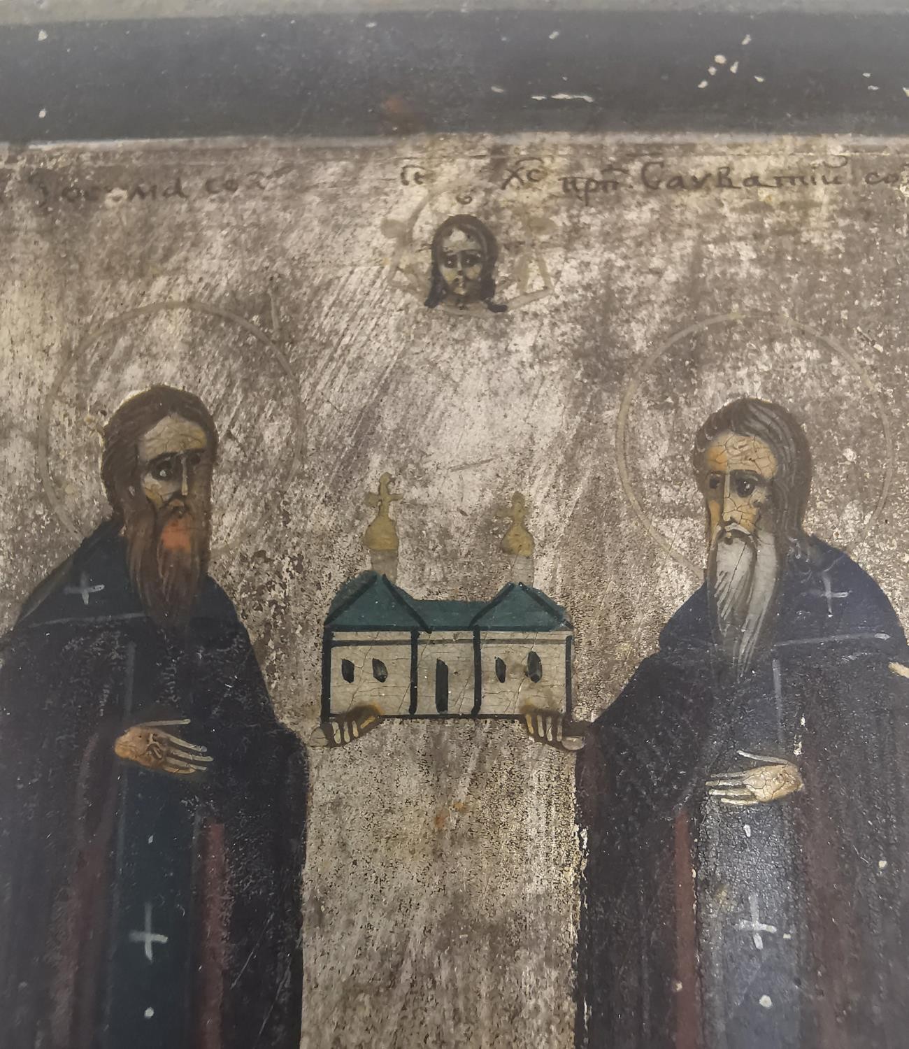 A 19th/early 20th century Orthodox painted religious icon on wood. Featuring two saints holding - Image 5 of 8