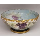 A Victorian T&V (Tressemann and Vogt) Limoges hand painted porcelain punch bowl. Decorated with