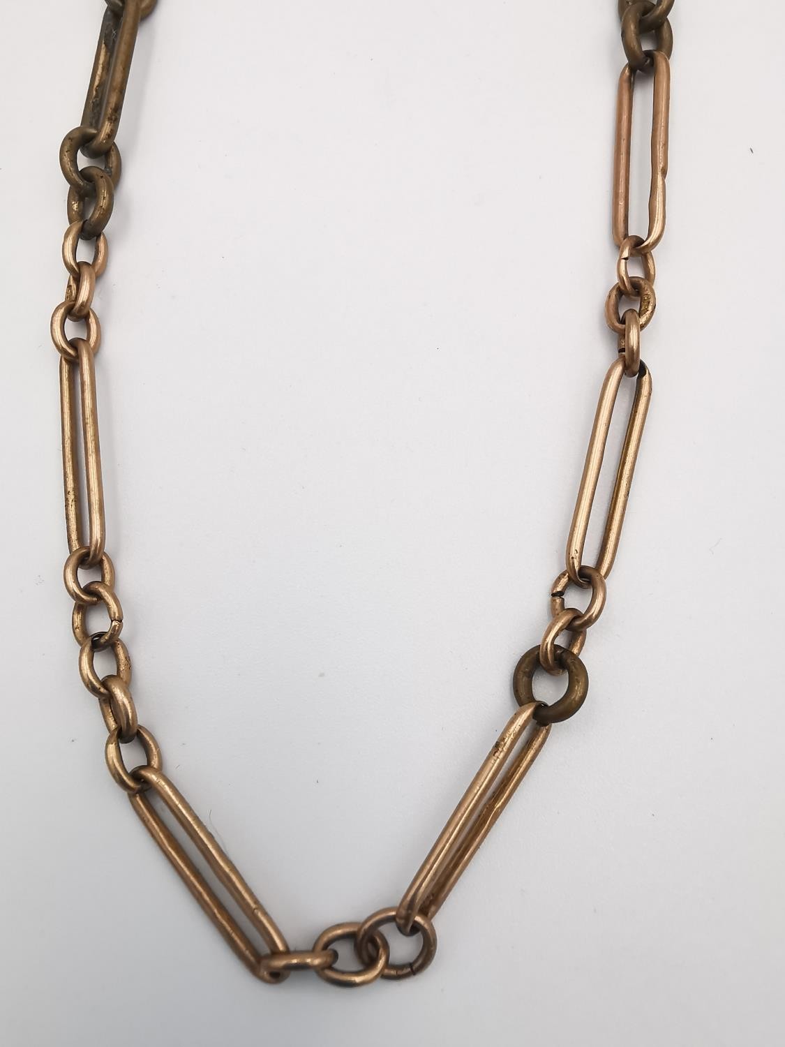 A collection of Victorian watch chains, including a 9ct rose gold and copper link pocket watch chain - Image 10 of 11