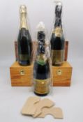 Three Fortnum & Mason boxed Champagne, Brut Reserve, two dated 1999 and one 2002. In wooden