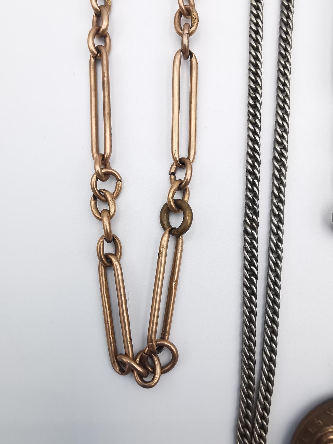 A collection of Victorian watch chains, including a 9ct rose gold and copper link pocket watch chain - Image 8 of 11