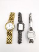 Three ladies Quartz fashion watches, including a silver and marcasite ladies fashion watch with