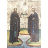 A 19th/early 20th century Orthodox painted religious icon on wood. Featuring two saints holding