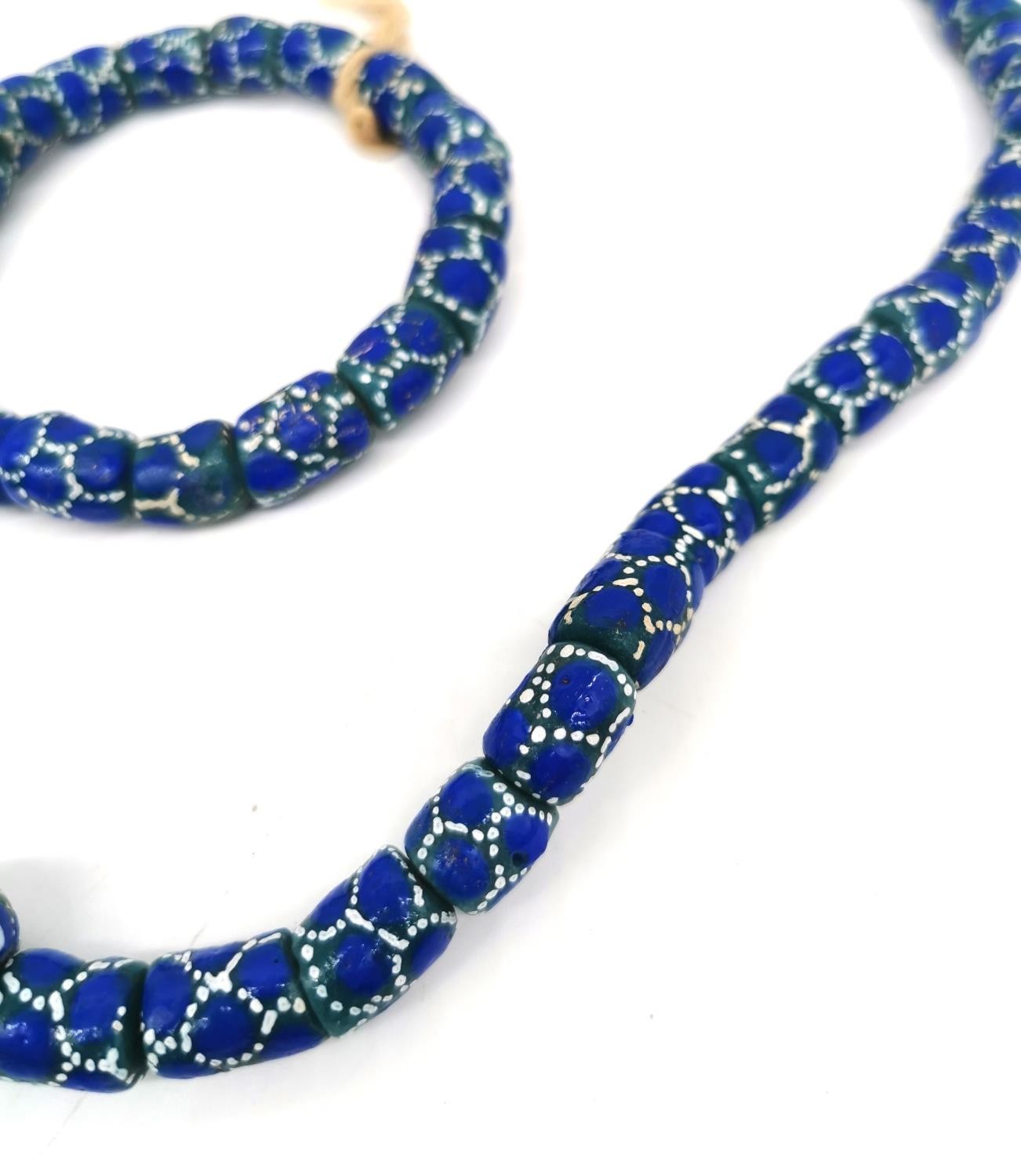 A collection of six African venetian glass trade bead necklaces and two bracelets. The long - Image 3 of 11