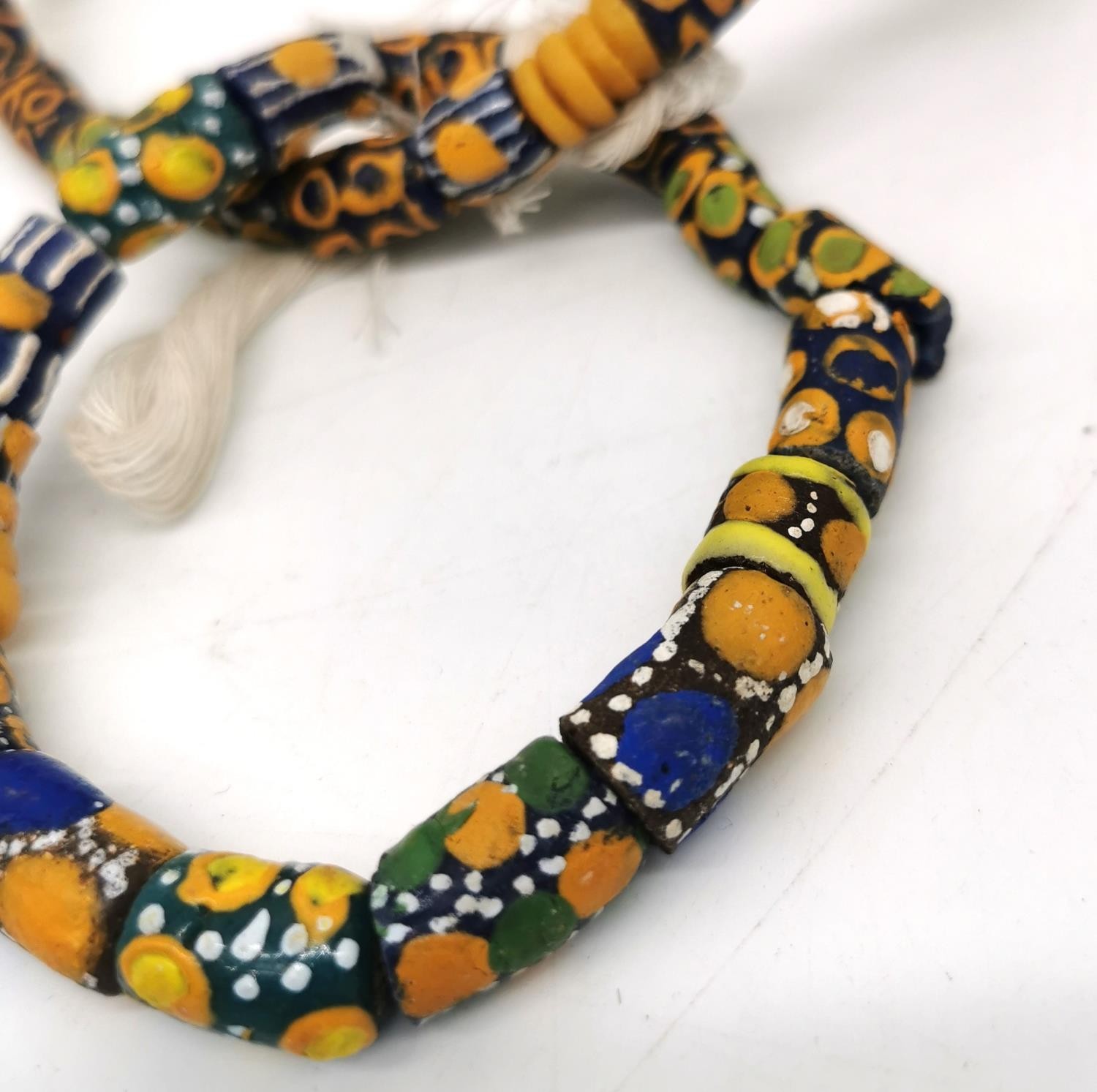 A collection of six African venetian glass trade bead necklaces and two bracelets. The long - Image 5 of 11