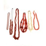 A collection of six coral bead necklaces, including a coral disc necklace, a Victorian coral bead