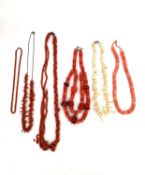 A collection of six coral bead necklaces, including a coral disc necklace, a Victorian coral bead