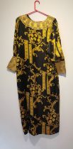 After Versace, a vintage black and gold silk Middle Eastern bespoke made robe with renaissance