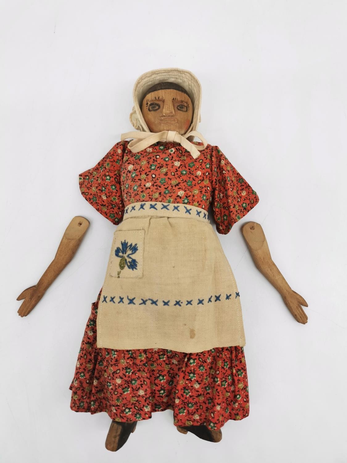 An early 20th century carved wood and cloth child's folk doll with drawn on features. L.32cm (arms - Image 3 of 7