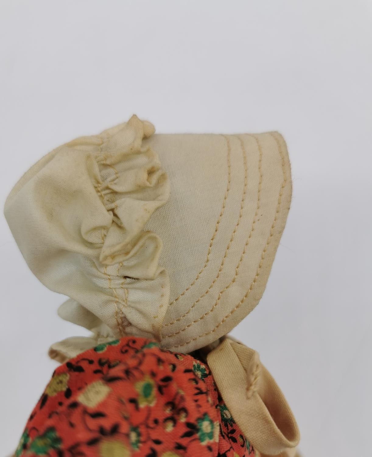 An early 20th century carved wood and cloth child's folk doll with drawn on features. L.32cm (arms - Image 7 of 7