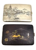 Two early 20th century Japanese cigarette cases, one silver niello work depicting mount Fuji and a