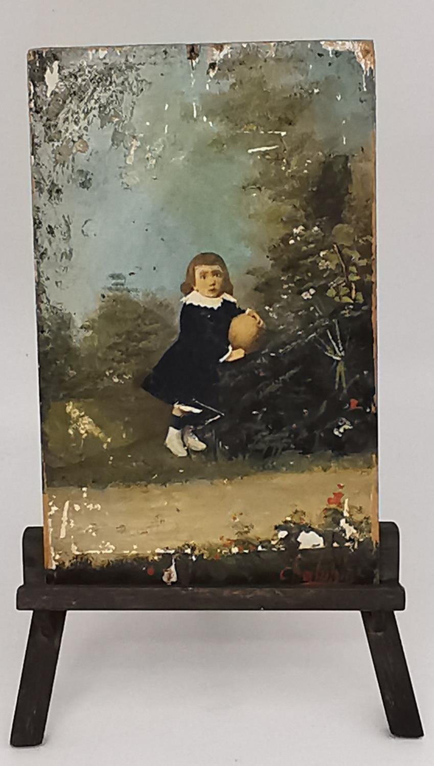 A miniature oil on board, overpainted photo of a 19th century child holding a ball, sits on a - Image 2 of 3