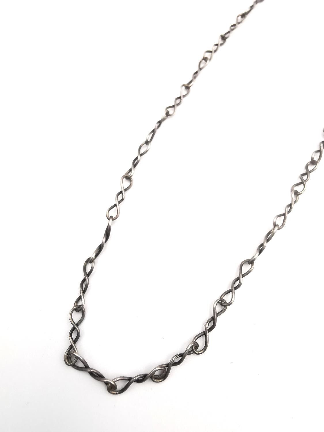 A collection of silver and white metal necklaces and chains, including a white metal snake chain and - Image 7 of 13