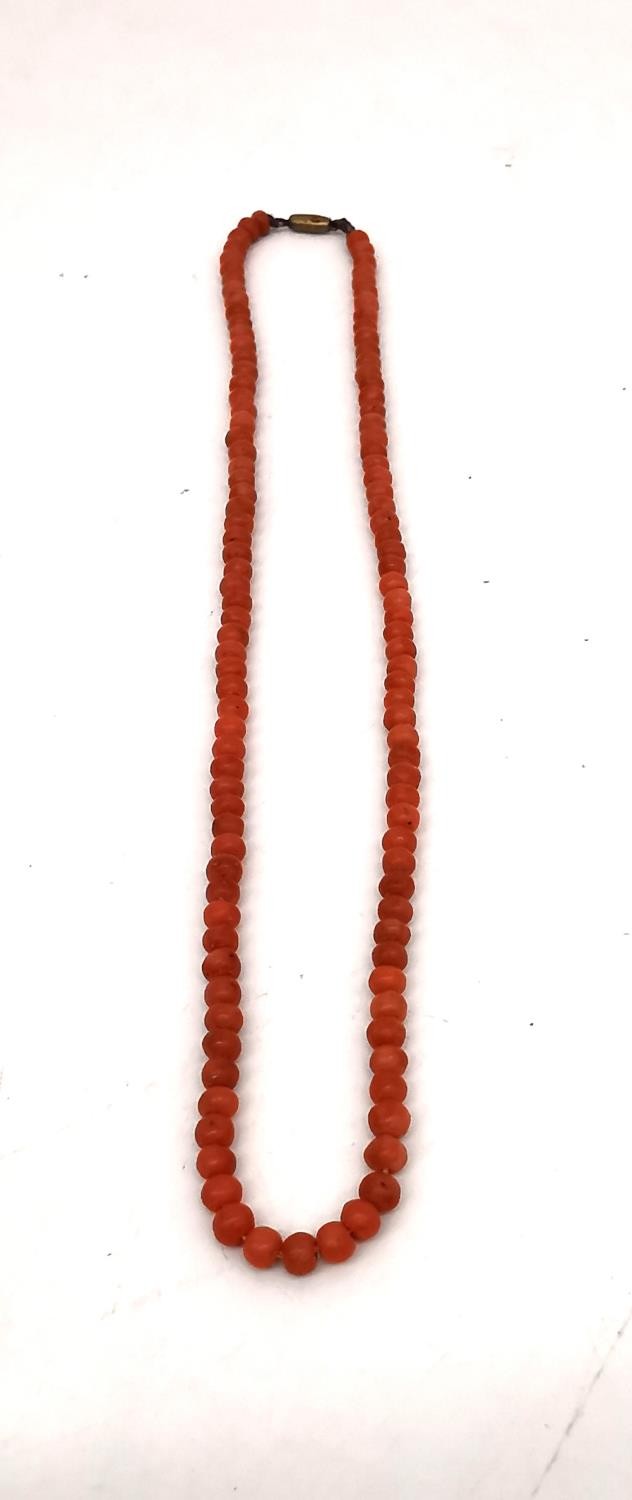 A collection of six coral bead necklaces, including a coral disc necklace, a Victorian coral bead - Image 9 of 10