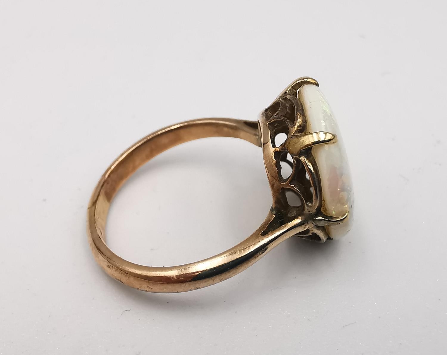 An early 20th century pink metal (tests as 9ct) white opal dress ring, set with a round white opal - Image 2 of 5