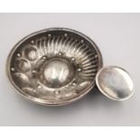 An early 20th century French silver tastevin by Cesar Tonnelier of classical form. French assay mark