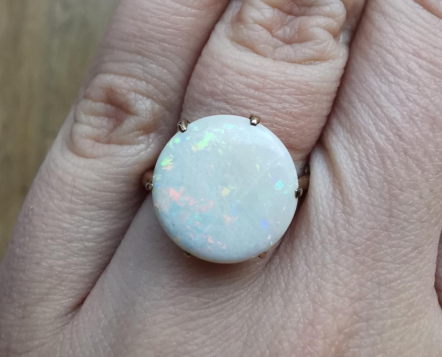 An early 20th century pink metal (tests as 9ct) white opal dress ring, set with a round white opal - Image 5 of 5
