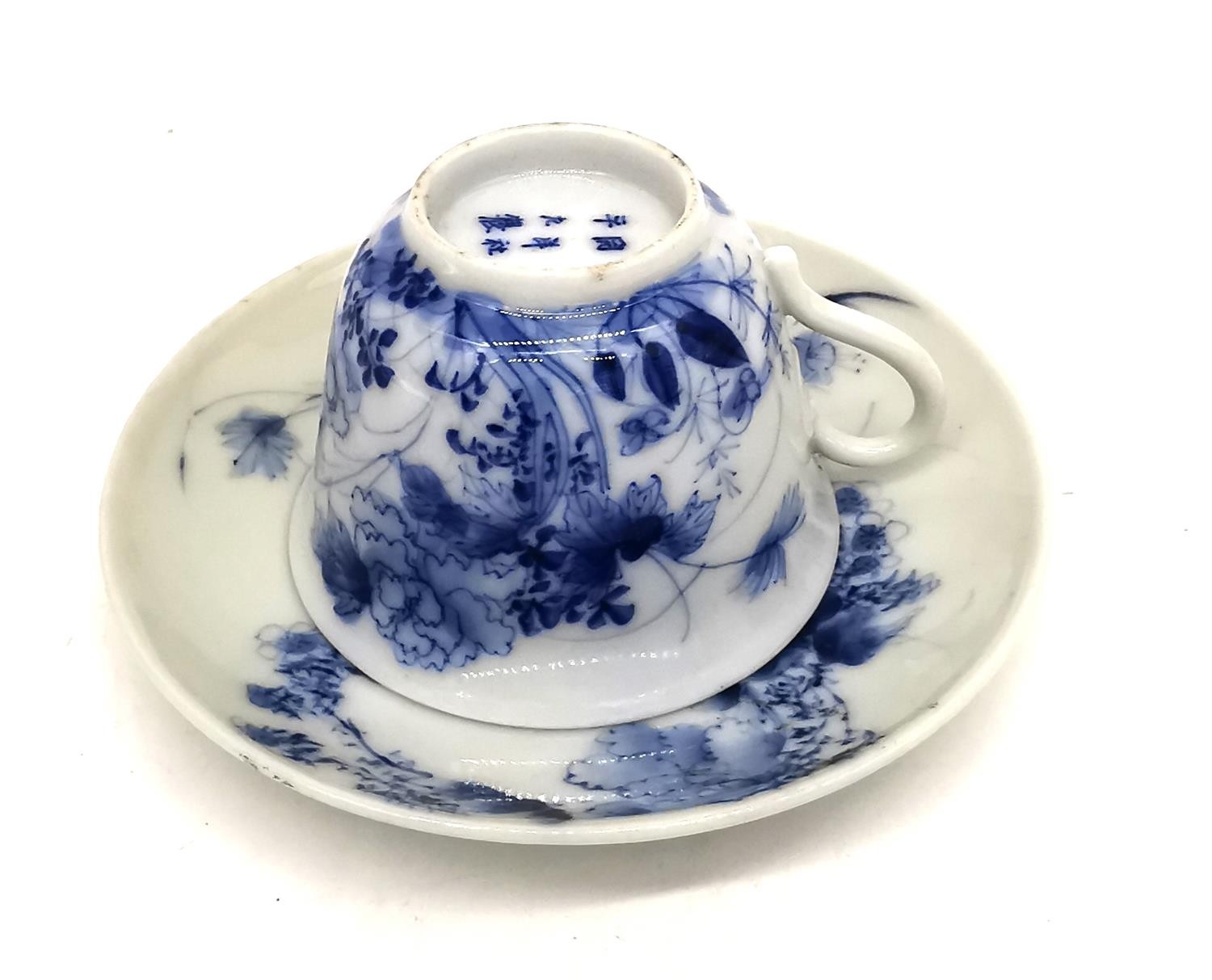 A Japanese 19th century hand painted porcelain small blue and white floral and foliate design teacup - Image 7 of 9